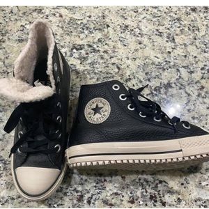 Leather, worn once and fur inside